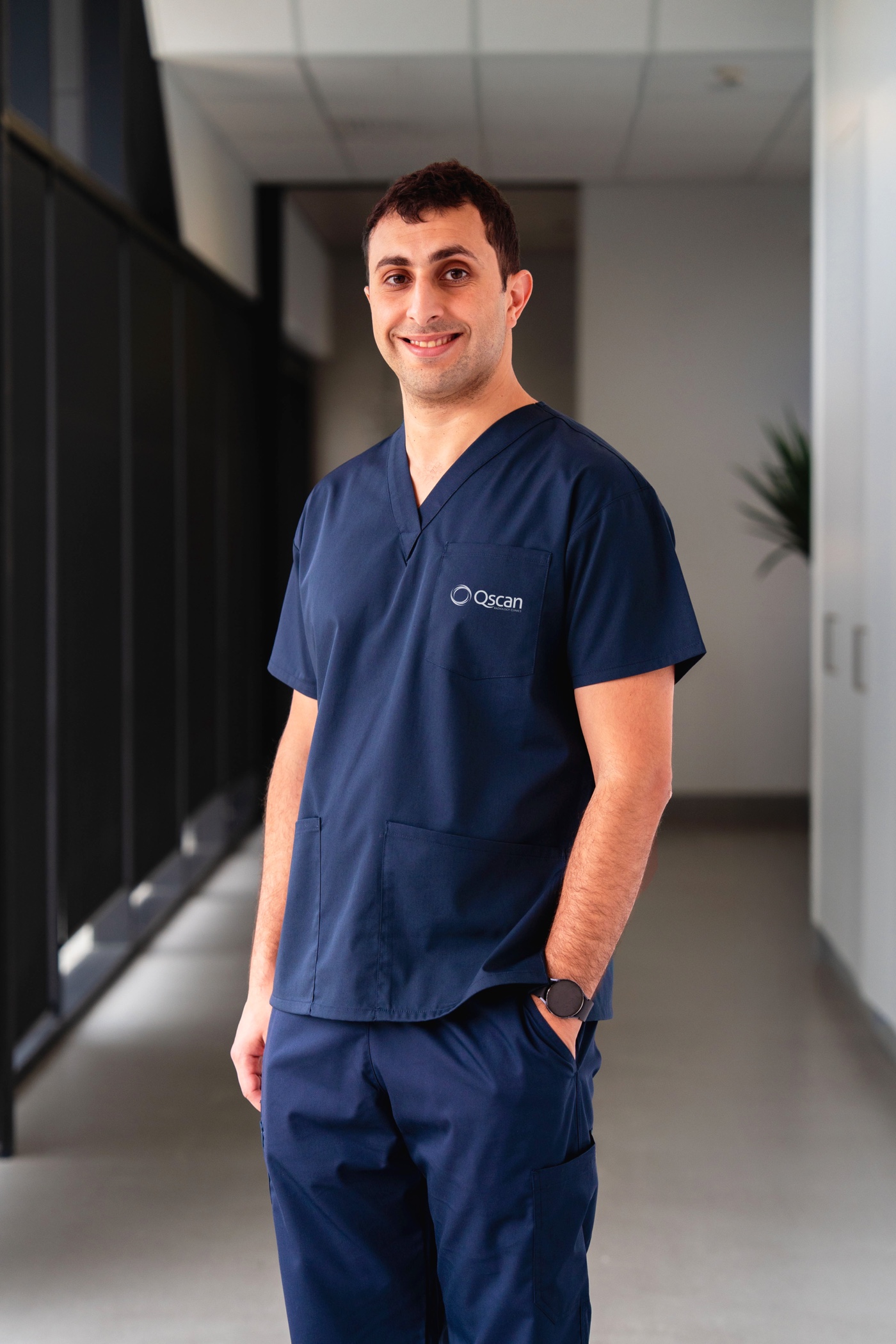 Dr Mark Bekhit in Qscan clinical scrubs